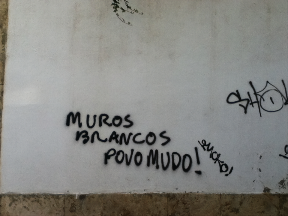 A graffiti painted on a white wall, Lisbon