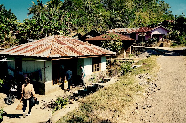 Figure 2. Therapeutic interventions into the Manggarai landscape: houses with cement foundations and metal roofs.