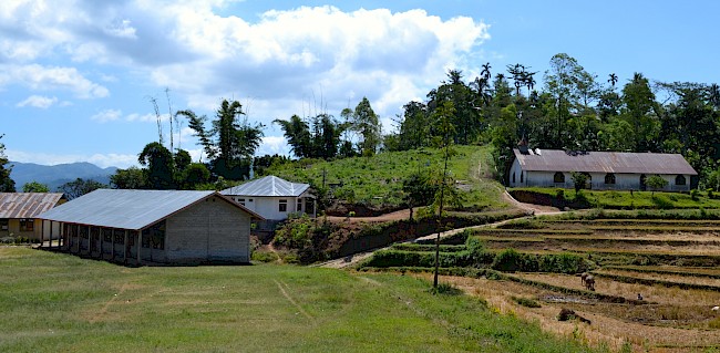 Figure 4. From left to right: Dantena’s soccer field, elementary school, village clinic, and chapel are all in Hamlet A.