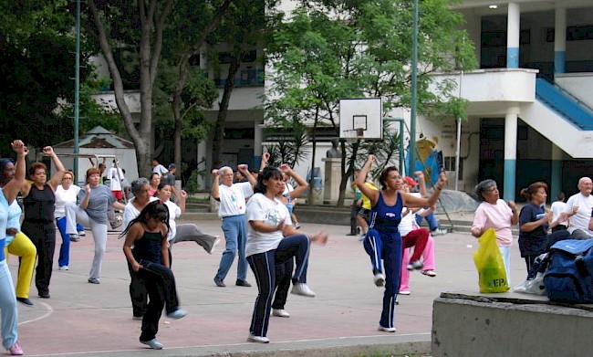Figure 3. Bailoterapia (dance therapy) with a Grandparents’ Club in a public school courtyard, Santa Teresa. Caracas, Venezuela 2006. Photo by the author.
