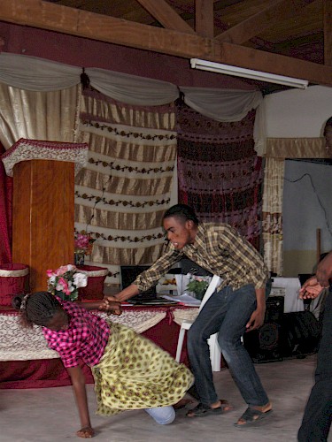 Faith healer exorcising a TB-bringing spirit, Lambaréné, Gabon, November 2012. Photo credit: A. L. Cremers.