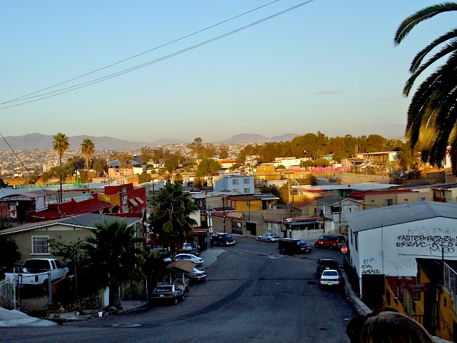1. Sun setting in Cindy and Beto’s Tijuana neighborhood. I didn’t know that it would be the last time I ever saw Cindy. Photo by Angela Bazzi.